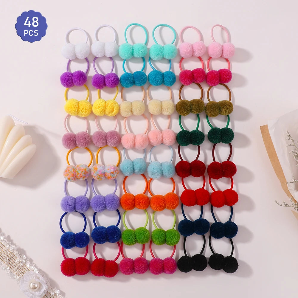 A collection of 48 colorful double plush elastic hair bands for girls in various shades of pink, blue, yellow, and green.
