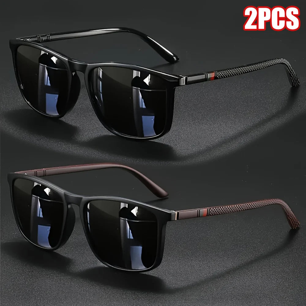 A pair of black vintage square polarized cycling sunglasses with brown accents shown against a dark background.
