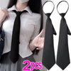 Two black clip-on security ties displayed on a white shirt and separate.