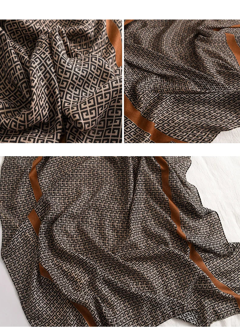 Nahaufnahme eines braun-cremefarbenen, geometrisch gemusterten luxuriösen Baumwoll-Pashmina-Schalsgewebes.