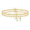 Gold plated initial letter anklet featuring a chain and a cross charm.