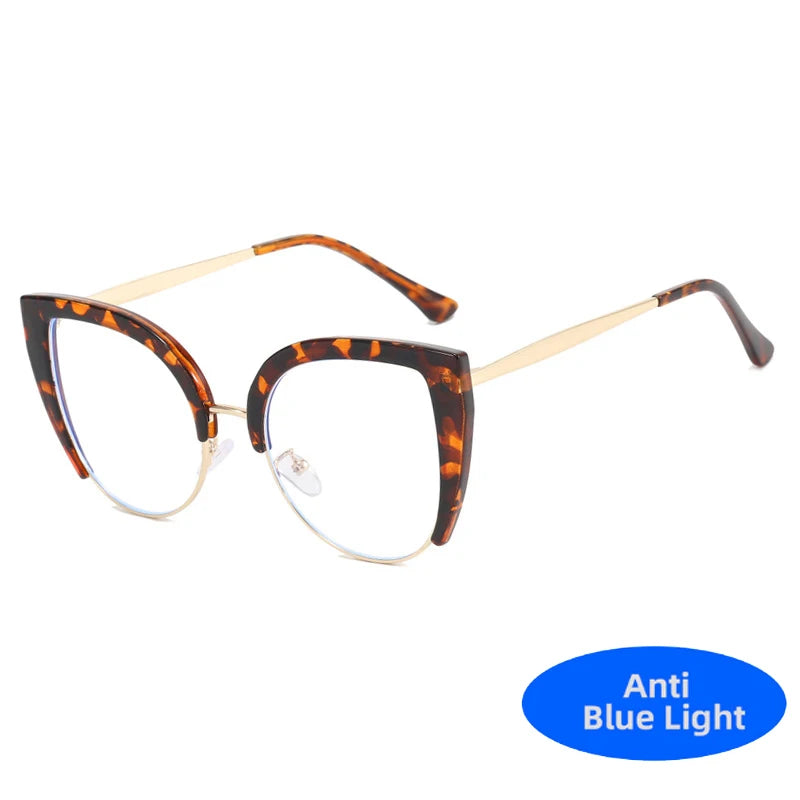 Vintage metal cat eye eyeglasses with tortoiseshell frames and gold accents.