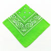 A bright lime green bandana featuring an intricate white bohemian print design.