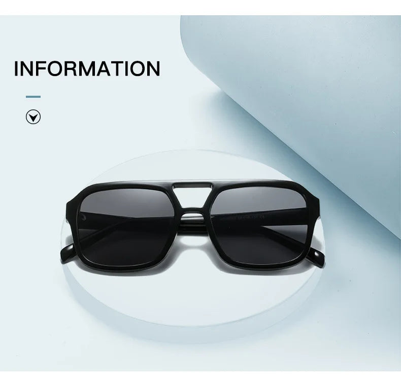 Ein Paar schwarze Vintage-Pilot-Sonnenbrille mit doppelter Brücke auf weißem Untergrund.
