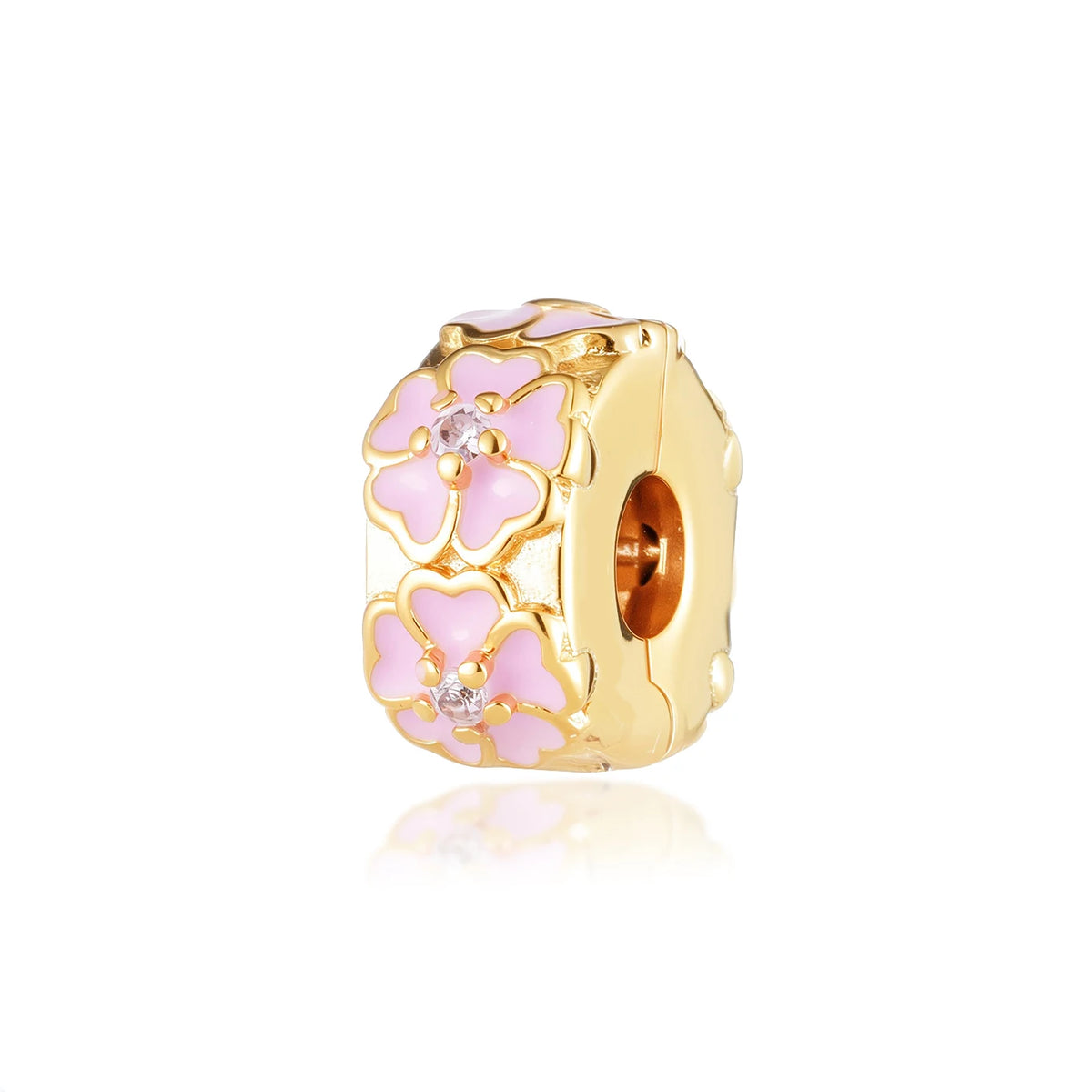 Adorno de cuenta tono dorado con diseños florales y de corazón rosa y piedras brillantes transparentes