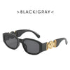 Schwarz- und grau getönte Vintage-Luxusscheiben-Sonnenbrille mit goldenen Akzenten