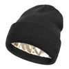 Black beanie hat with a satin gold lining visible at the opening