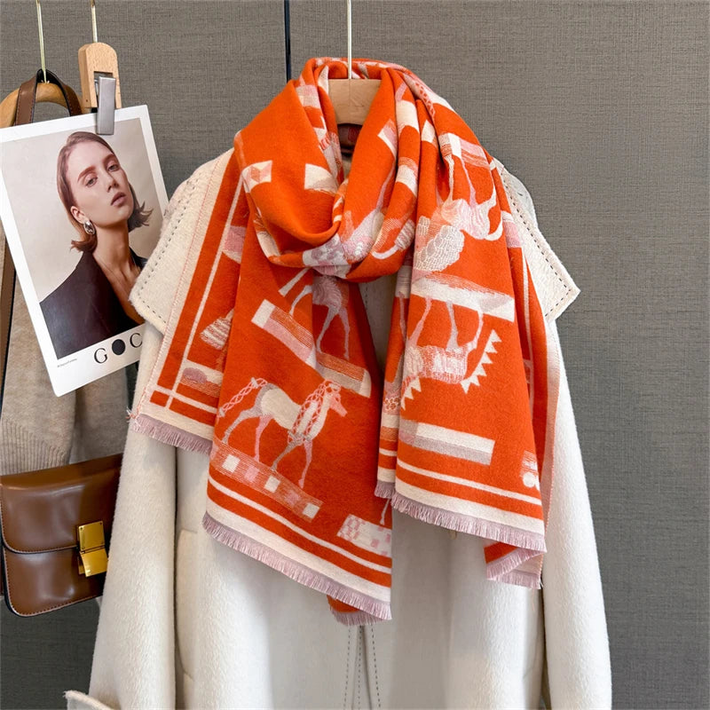 Orange and white plaid cashmere feel scarf draped around a white coat