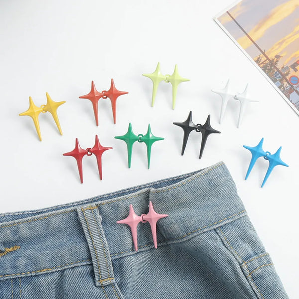 A collection of star-shaped decorative waist buckle buttons in various colors including yellow, orange, green, black, white, 