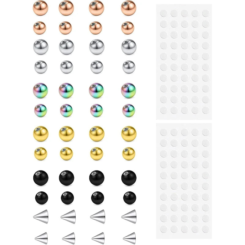 A collection of replacement fake eyebrow and lip labret studs in various colors and styles.