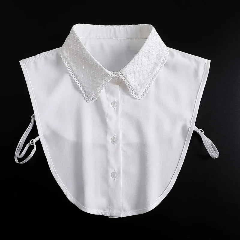 White blouse with a detachable false collar neckline and buttons
