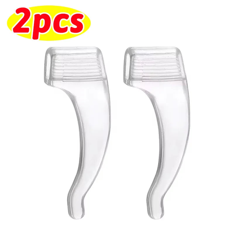 A pair of clear silicone anti-slip ear hooks for eyeglasses.