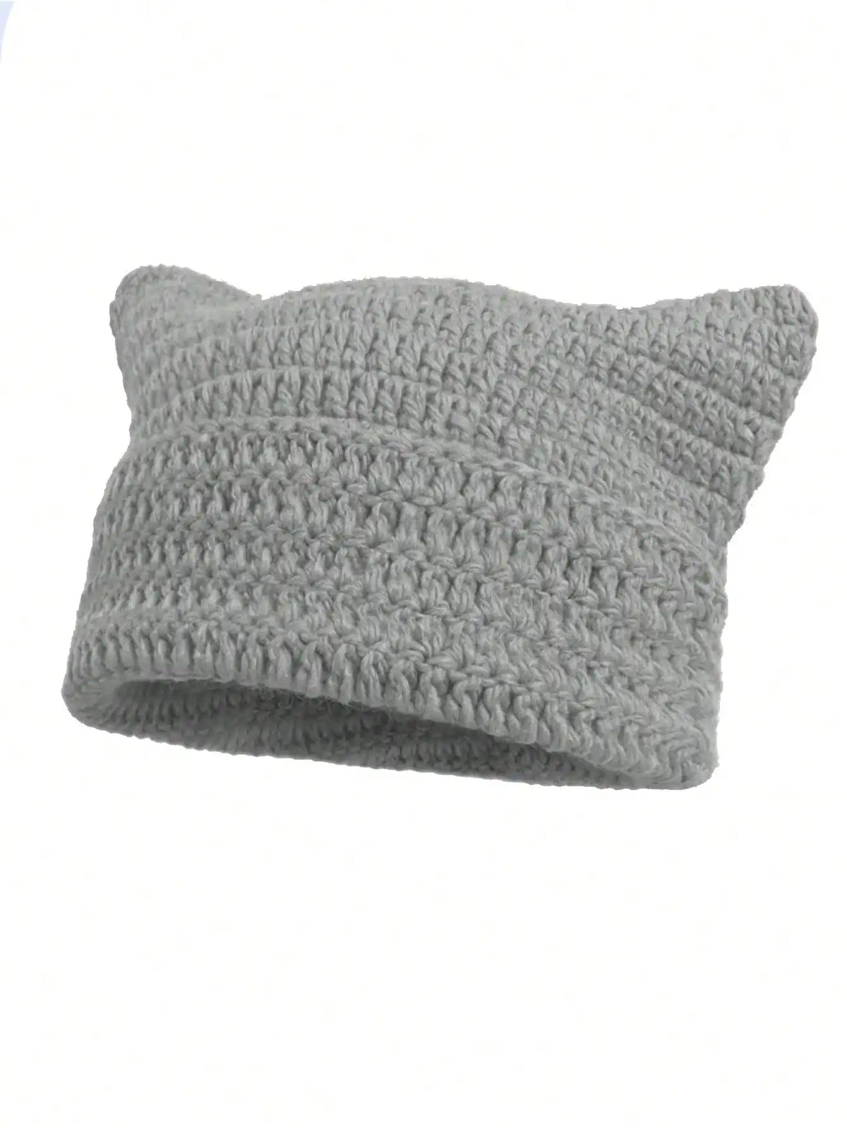 A light gray crocheted beanie hat with cat ear style ears.