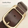 A close-up of a brown leather belt buckle and strap with gold accents, showing all-in-one molding.