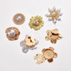 A collection of floral button cufflinks featuring pearl and gold accents for formal wear.