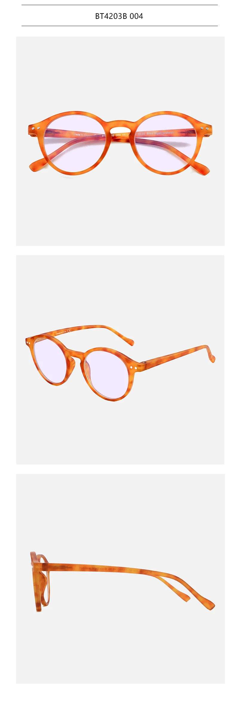 A pair of orange-tinted reading glasses with thin wire frames.