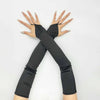 A pair of black satin fingerless gloves with metallic accents are displayed in an X shape against a white background.