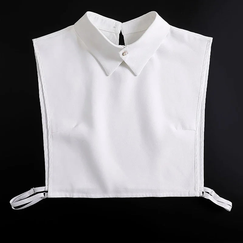 White fashionable blouse with a false collar and detachable neckline