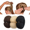 A set of four fabric hair buns in brown, beige, black, and dark brown.