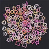 A collection of 10 pink and cream resin nail art charms featuring various shapes like stars hearts and circles