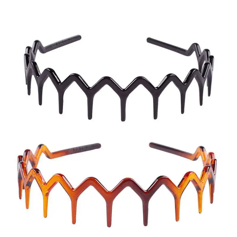 A set of anti-slip toothed hair accessories in a glossy amber or caramel color.