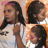 A woman modeling a black braided wig with a full lace front and gold accents.
