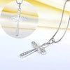 Silver cross pendant necklace for women featuring a detailed design and chain.