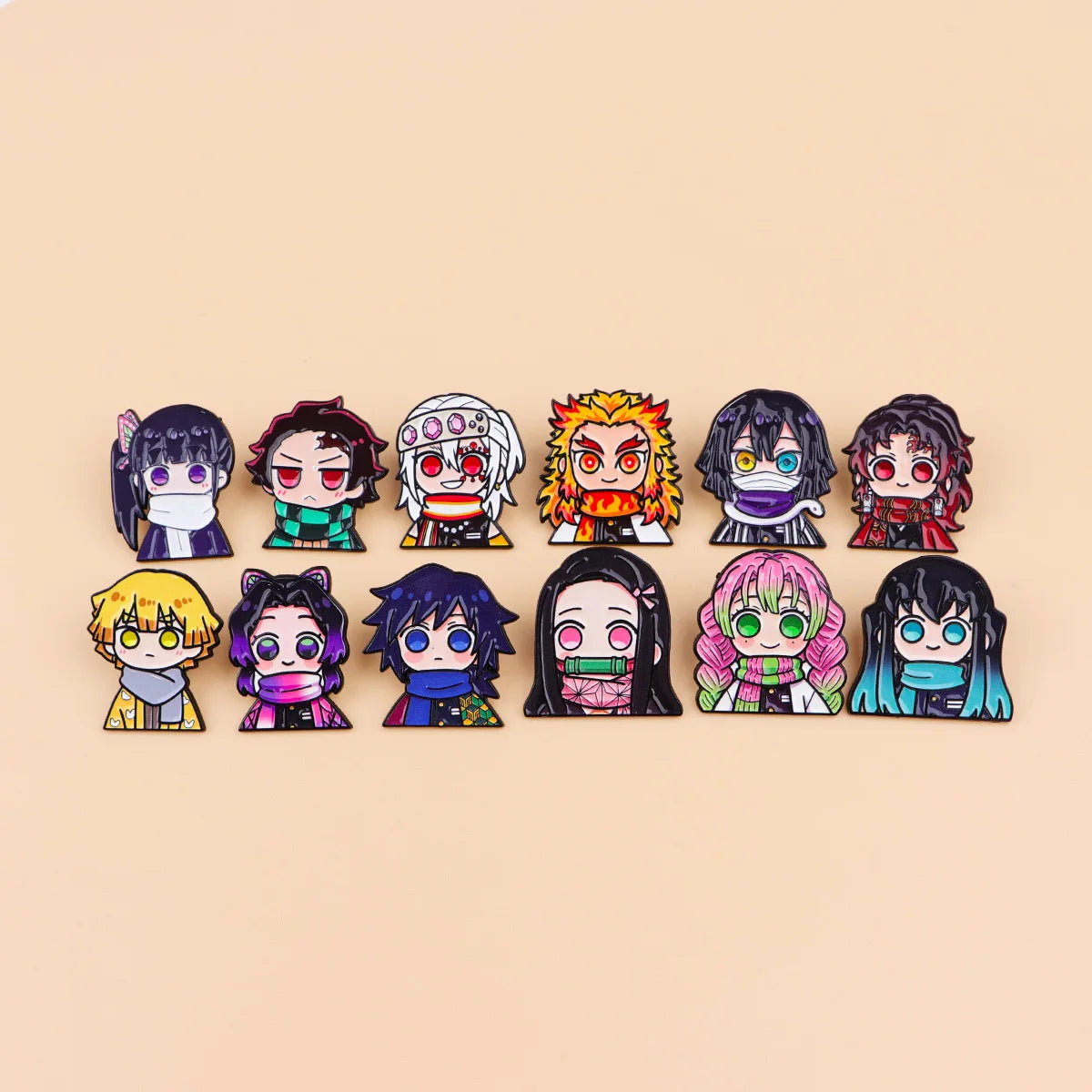 A collection of twelve enamel pin brooches featuring various anime-style characters with diverse hair colors and expressions.