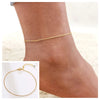Gold stainless steel snake chain anklet worn on a woman's ankle and shown separately.