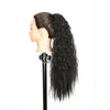 A dark black ponytail hair extension is displayed on a mannequin head.