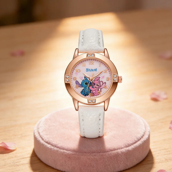 A pink and blue cartoon Stitch quartz wristwatch with a white strap displayed on a pink stand.
