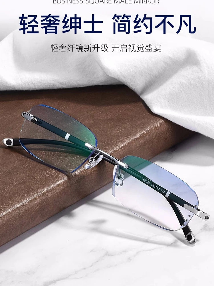 A pair of clear, frameless reading glasses with a light blue tint resting on a brown leather surface.