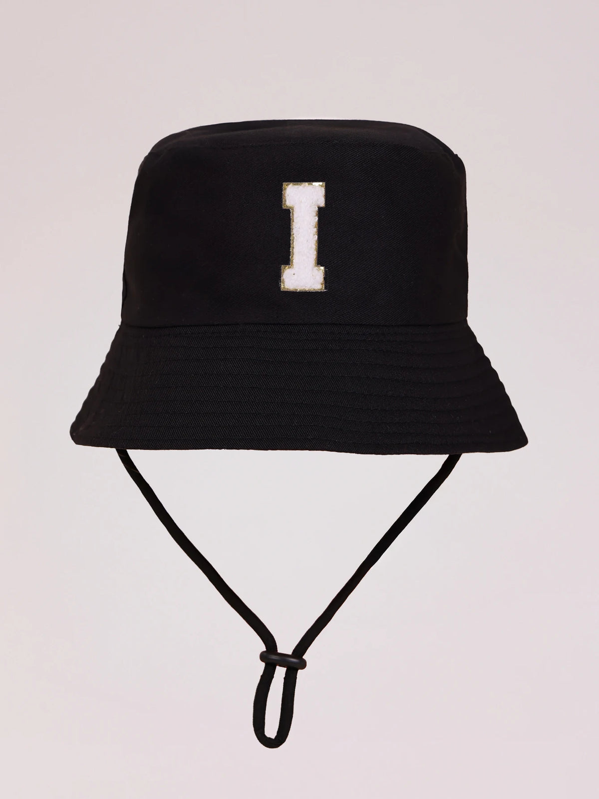 Black sun hat with a large white letter I embroidered on the front and an adjustable cord.
