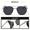 Details of silver-framed, dark gray polarized square sunglasses showing the mirror leg, nasal pad, and spring hinge.