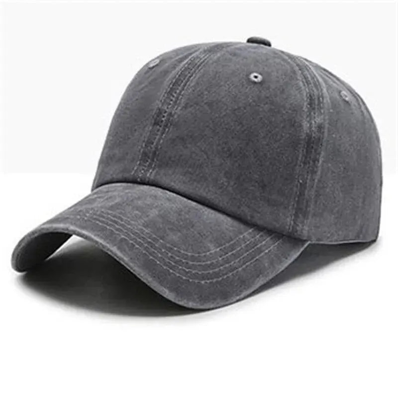 A dark gray casual baseball cap shown from above, featuring a curved brim and a small metal snap closure.