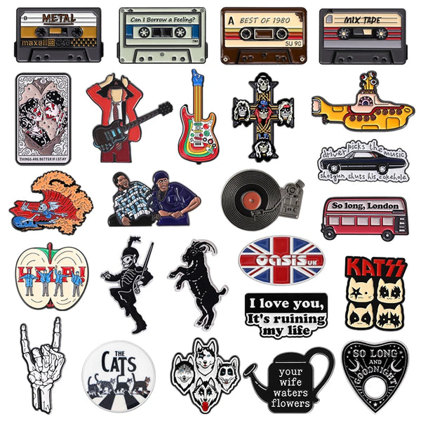 A collection of retro band enamel pins and brooches featuring various musical themes and band logos.