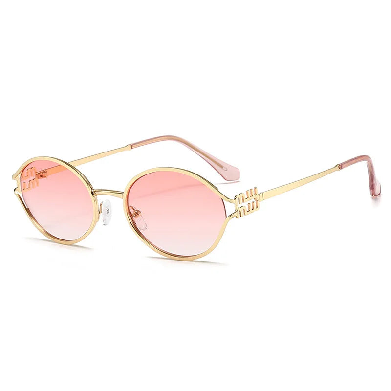 Retro ovale Sonnenbrille mit rosa Linsen und goldfarbenem Metallrahmen