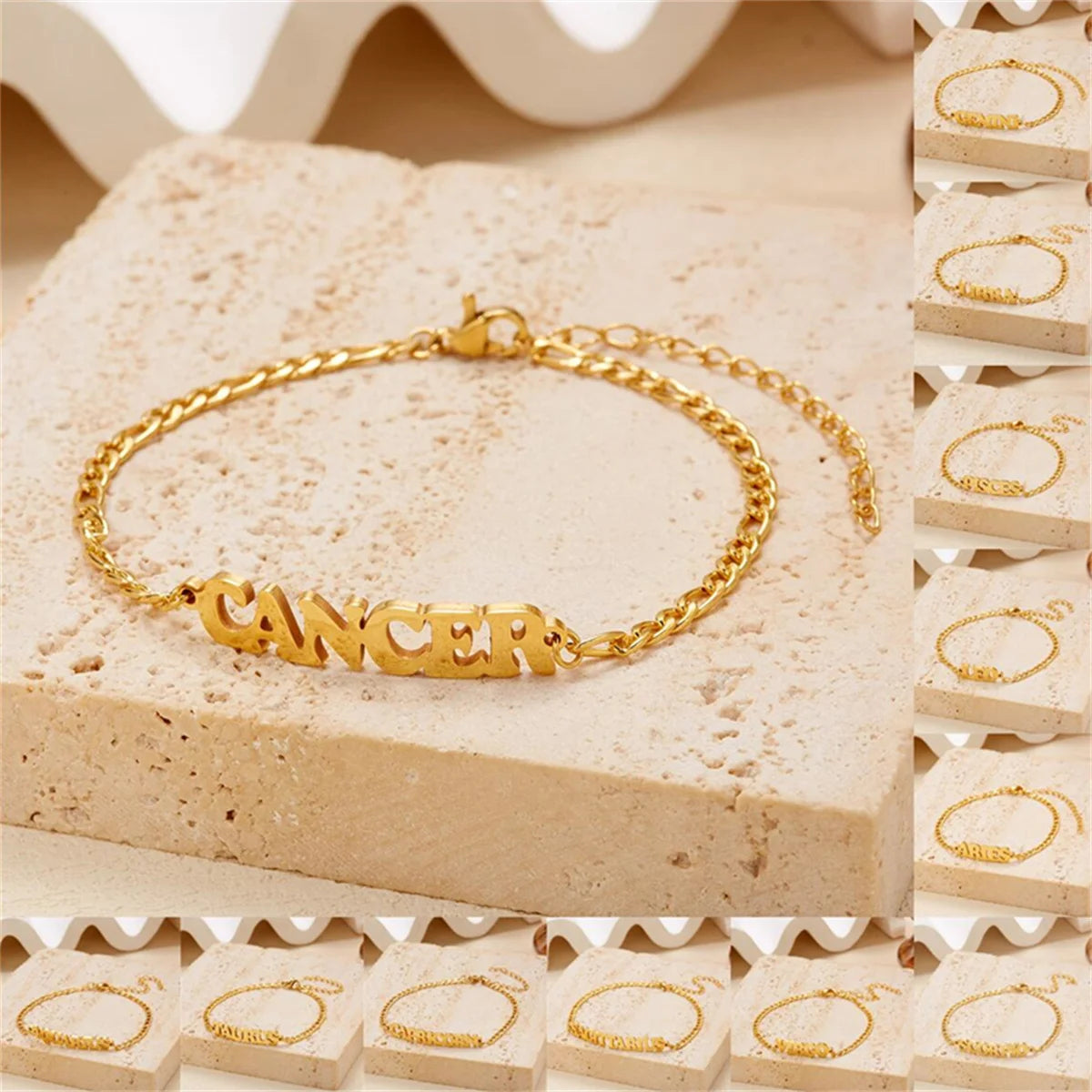 A gold stainless steel zodiac constellation charm bracelet featuring the Cancer sign, displayed on a light background.