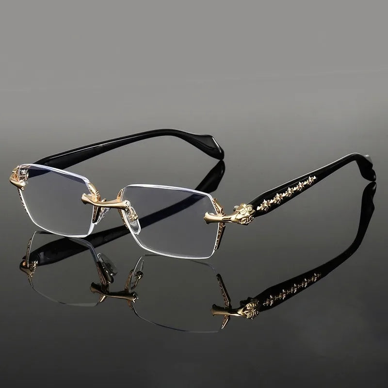 A pair of retro full-frame anti-blue light eyewear with gold accents resting on a reflective surface.