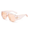Retro oval sunglasses with rose gold frames and amber tinted lenses