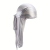 A light gray silky durag shower cap bandana draped around the head.
