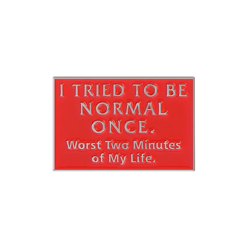 A red enamel lapel pin with white text that reads I tried to be normal once Worst two minutes of my life.