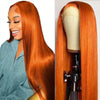 A close-up of a long, straight orange hair wig displayed on a mannequin head.