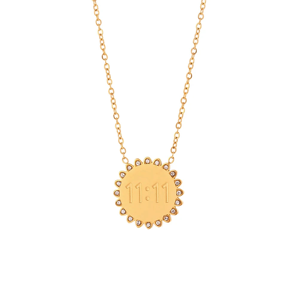 A gold-plated rectangle pendant necklace featuring the number 11:11, suspended from a delicate gold chain.