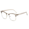 Gafas de acetato claras con varillas metálicas finas y diseño de aro completo