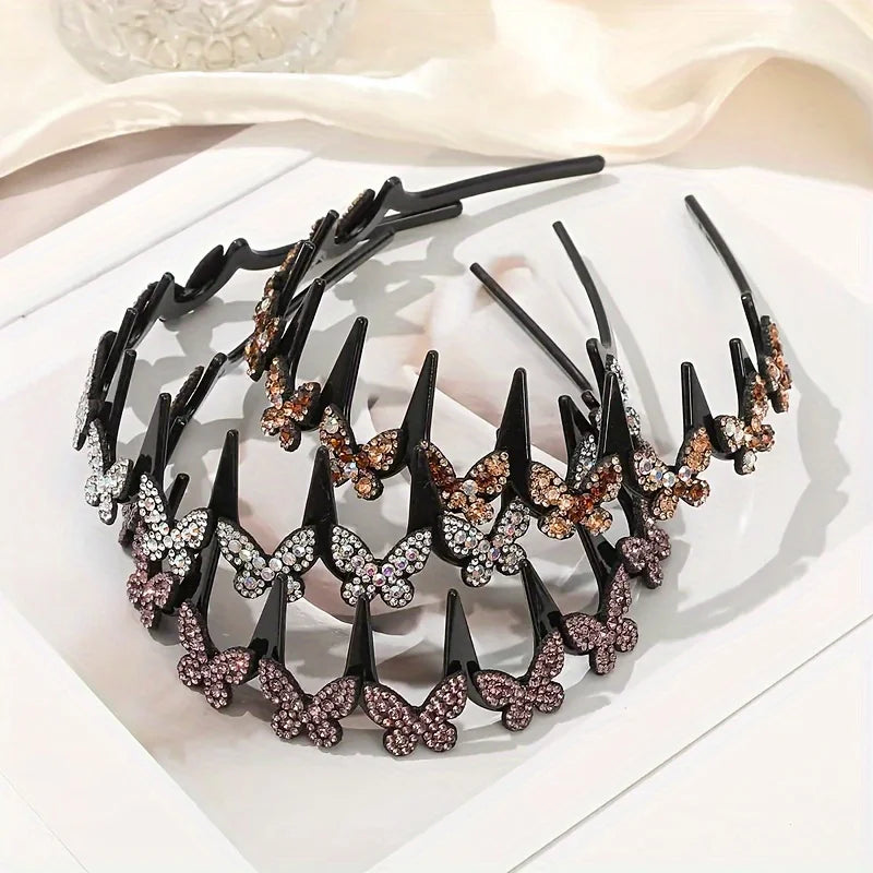 Black hair accessory featuring multiple rhinestone butterfly clips arranged in a curved line.