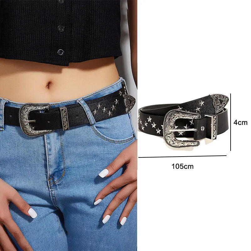Black leather goth punk belt with silver bullet studs worn on a denim outfit.