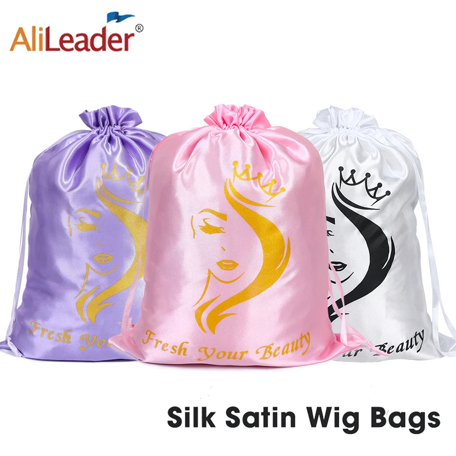 Three silk satin wig bags in purple, pink, and white are displayed for storage.