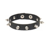 Set of black leather cuff bracelets with silver spikes and studs