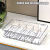 A clear plastic multi-compartment organizer for storing coffee and tea bags.